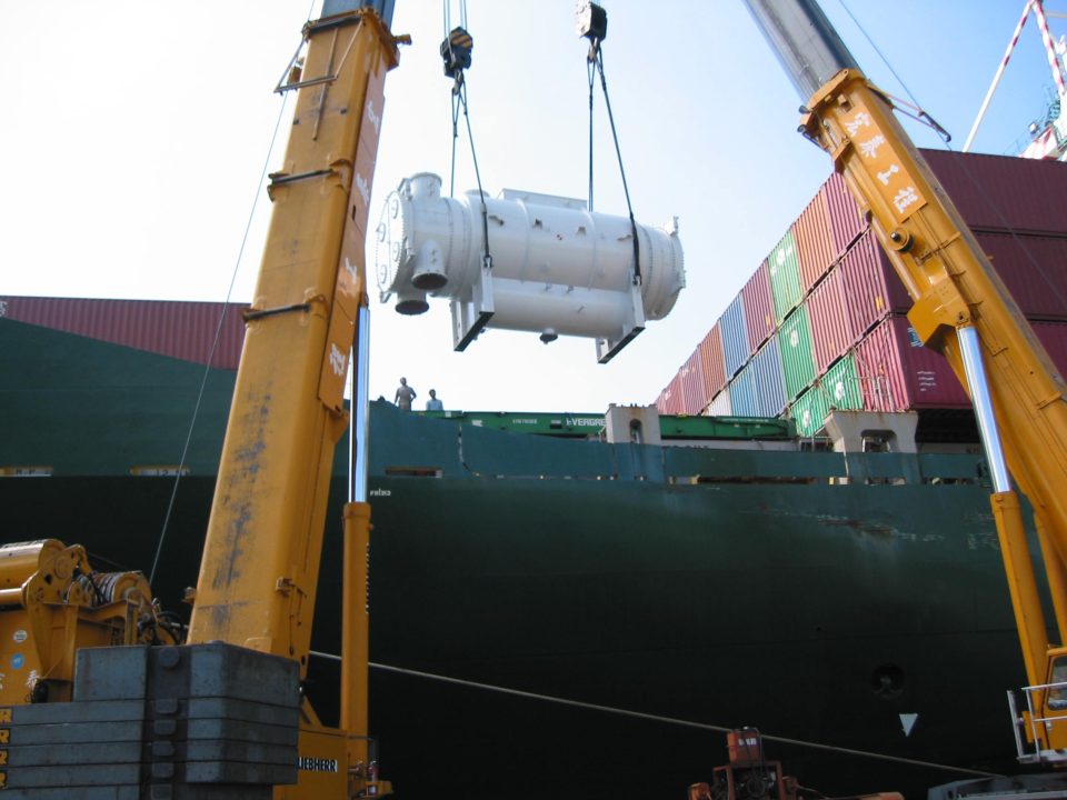Condenser being lifted onto ship